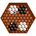 同於六角棋盤的座標法。X、Y、Z的棋珠位置分別在G5、C2、H9。