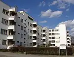 Panzerkreuzer apartment building, a white four storey apartment complex