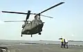 127 Squadron CH-47SD lands aboard USS Rushmore during Exercise CARAT 2001.