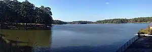 A photo of Choctaw Lake and the surrounding forest taken from above the spillway