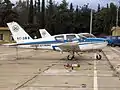 希臘海岸警衛隊的SOCATA TB family（英语：）單引擎飛機停駐在塔托伊機場（英语：）.