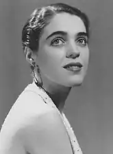 Black-and-white photo of a young woman with dark hair.