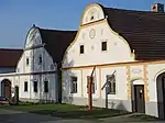 Two village houses with painted facades