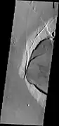 Western part of Jovis Tholus, as seen by THEMIS on Mars Odyssey spacecraft. Jovis Tholus is in the Tharsis quadrangle.