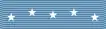 A light blue ribbon with five white five pointed stars