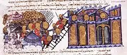 Medieval miniature depicting a city being stormed. To the left is the Byzantine army, with shields and spears, with the tents of their camp to their back. They are scaling ladders onto the walls of a city (right), whose defenders try to fight them off from their top.