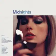 Cover artwork for "Moonstone Blue" edition of "Midnights" vinyl records: White background, with a square image of Taylor Swift in makeup holding a lighter on the bottom right corner, occupying two thirds of the image. There is a track list on the left of the image, featuring undisclosed track titles.