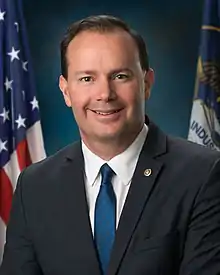 Upper-body portrait of a twenty-first-century man in a suit.