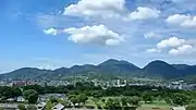 熊本城天守閣往西方所見的金峰山（日语：）周邊市區