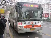 重组前中北巴士的橘红色涂装（68路于珠江路，型号为宇通ZK6120HG）