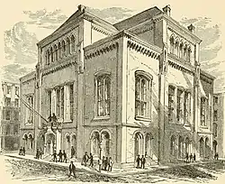 depiction of the Old Produce Exchange, a 3-story building