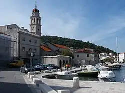 Pučišća harbor, with church