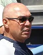 A side-view of Reggie Jackson wearing sunglasses.