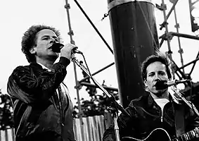 Paul Simon (right) and Art Garfunkel performing in Dublin, 1982