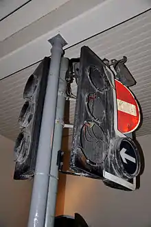 Fire engine with extended ladder in a street full of rubble